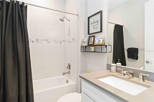 full bathroom featuring toilet, vanity, and shower / tub combo with curtain