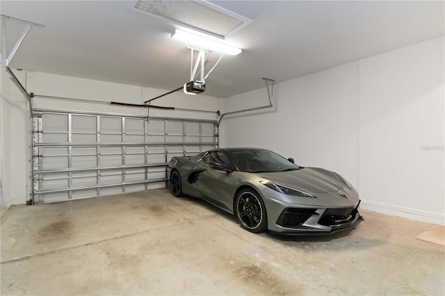 garage featuring a garage door opener