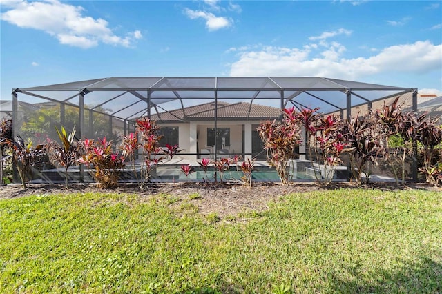 view of yard featuring glass enclosure