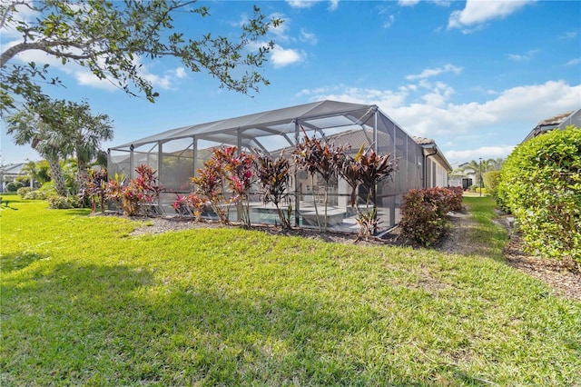 view of yard featuring a lanai