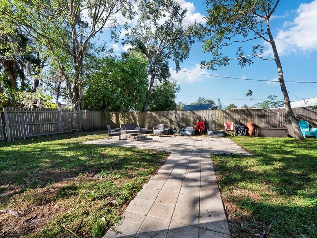 view of yard with a patio area