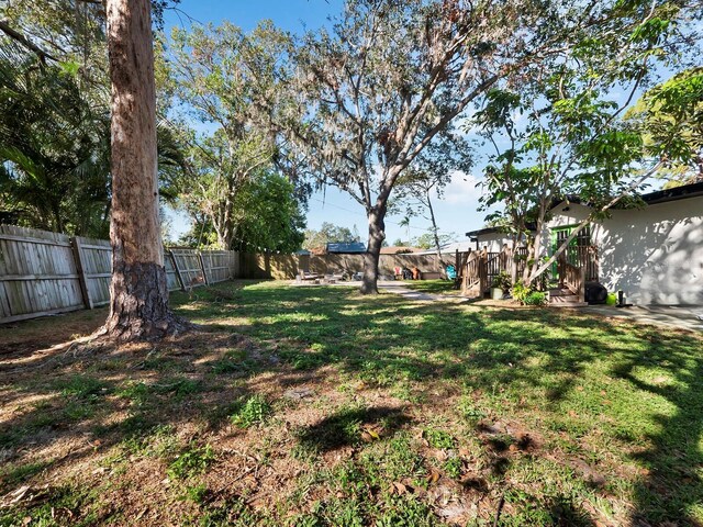 view of yard featuring a deck