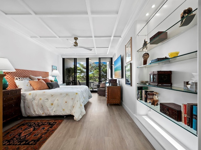 bedroom featuring floor to ceiling windows, ceiling fan, coffered ceiling, and light wood-type flooring