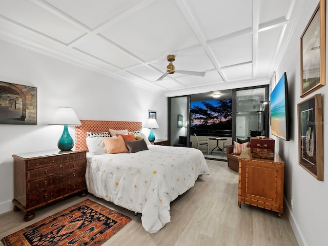 bedroom with ornamental molding, light wood-type flooring, ceiling fan, and coffered ceiling