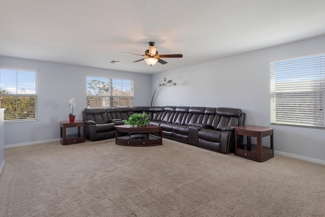 15404 Trinity Fall Way, Bradenton, FL 34212 - living area featuring ceiling fan and carpet floors