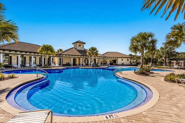 15404 Trinity Fall Way, Bradenton, FL 34212 - community pool featuring a patio