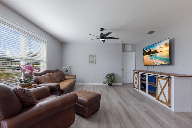 15404 Trinity Fall Way, Bradenton, FL 34212 - living room with light wood-style floors and ceiling fan