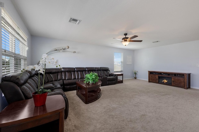15404 Trinity Fall Way, Bradenton, FL 34212 - living area with ceiling fan and carpet floors