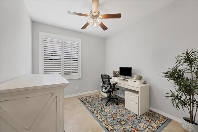 tiled office space with ceiling fan