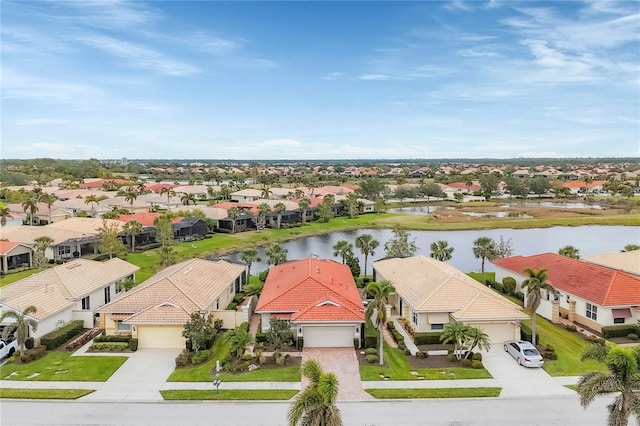 aerial view featuring a water view