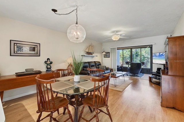 dining room featuring ceiling fan and light hardwood / wood-style floors