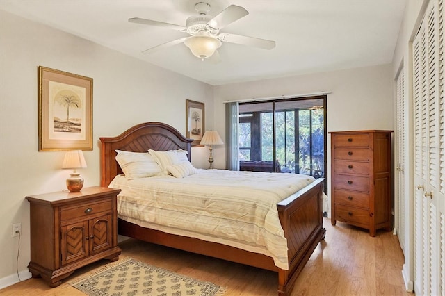 bedroom with ceiling fan, a closet, and light hardwood / wood-style flooring