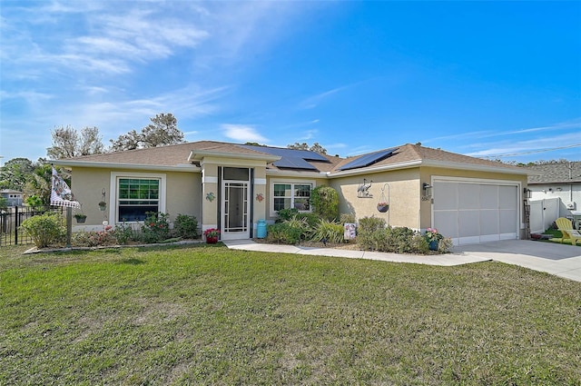 view of front facade featuring solar panels, a garage, and a front lawn