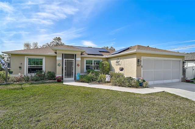 view of front facade featuring solar panels, a garage, and a front yard