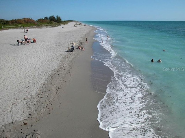 property view of water featuring a beach view