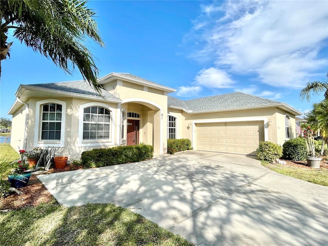 view of front of home with a garage