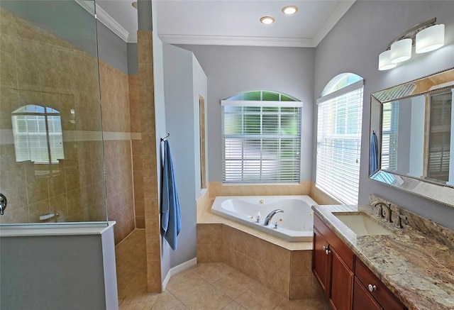 bathroom with vanity, ornamental molding, tile patterned floors, and separate shower and tub