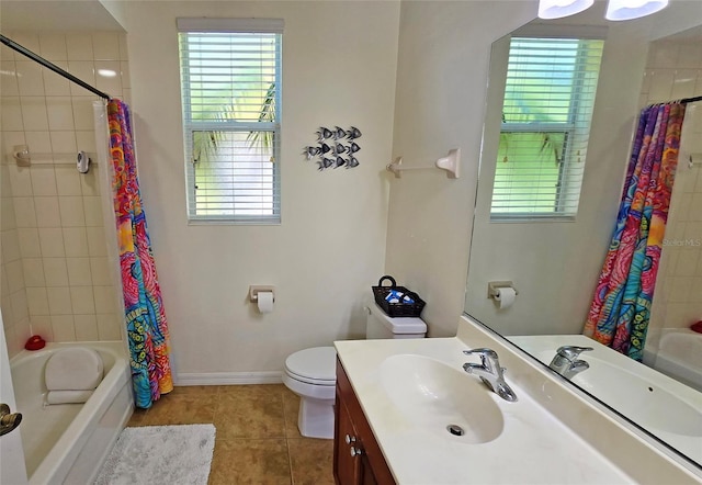 full bathroom with tile patterned floors, toilet, shower / tub combo, and vanity