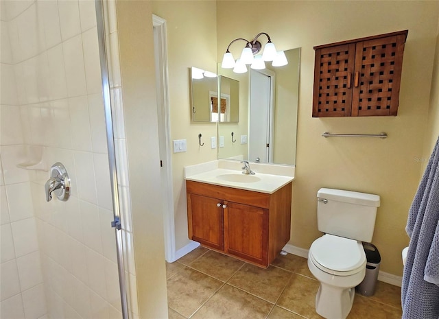 bathroom with vanity, toilet, an enclosed shower, and tile patterned flooring