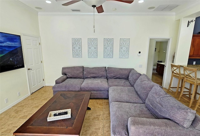 living room featuring light tile patterned flooring, ceiling fan, and crown molding