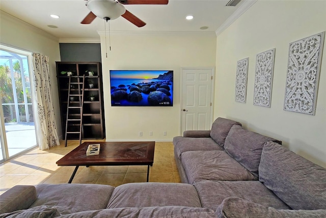 living room featuring ceiling fan, ornamental molding, and light tile patterned floors