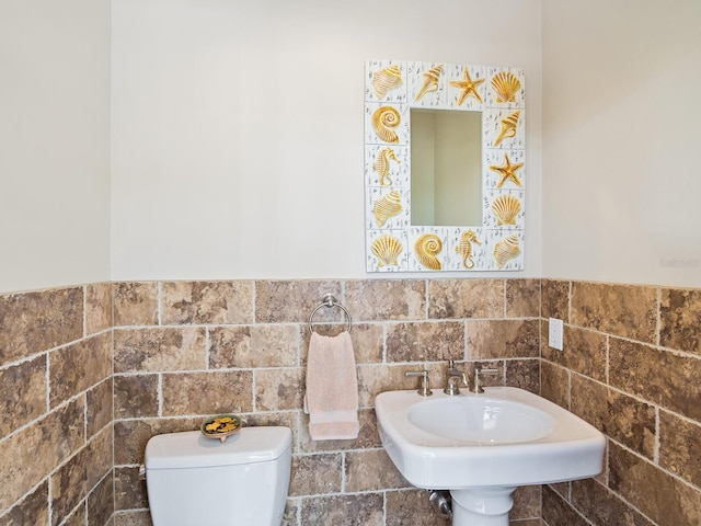 bathroom featuring sink and toilet