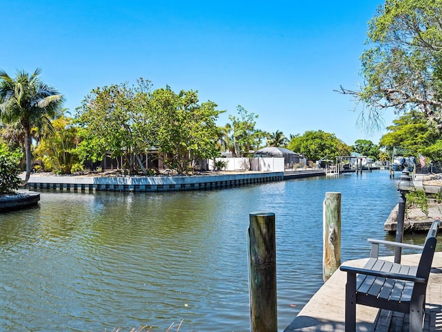 dock area featuring a water view