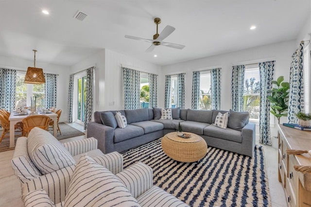 living room with ceiling fan