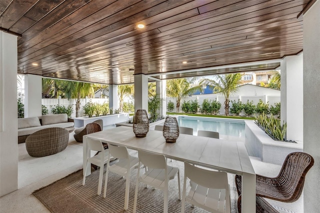 sunroom / solarium with wood ceiling