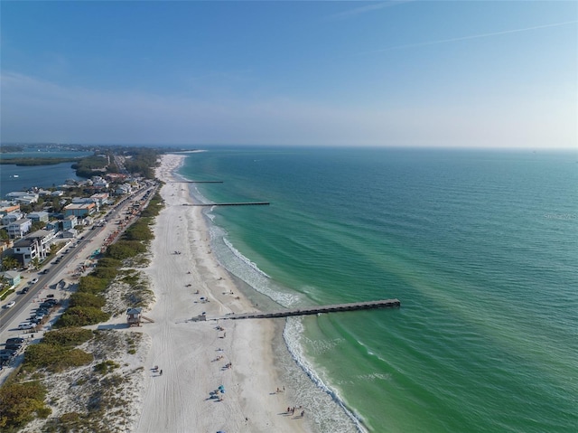 bird's eye view featuring a water view and a view of the beach