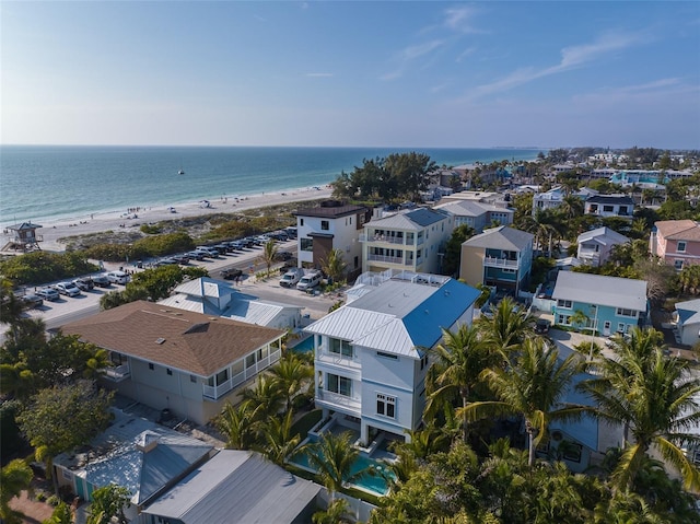 aerial view with a view of the beach and a water view