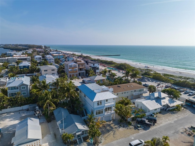 bird's eye view featuring a beach view and a water view