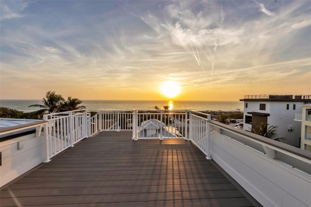 deck at dusk with a water view