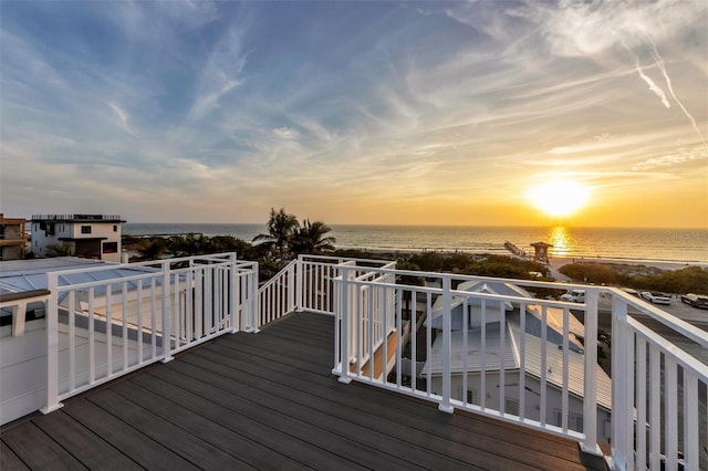 deck at dusk with a water view