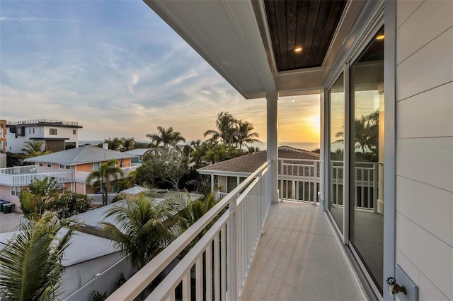 view of balcony at dusk