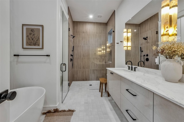 bathroom with separate shower and tub and vanity