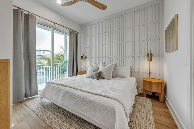 bedroom featuring access to outside, ceiling fan, and light hardwood / wood-style floors