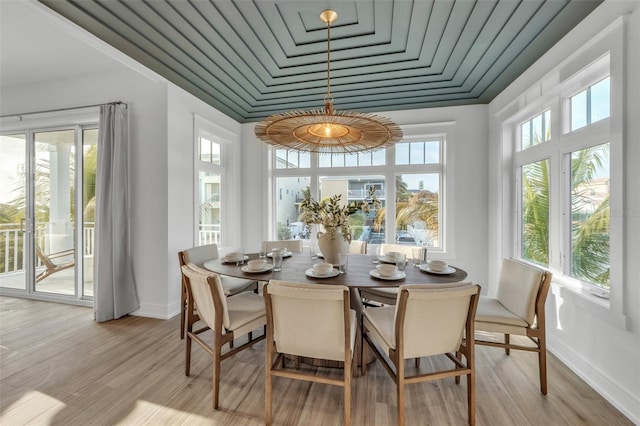 sunroom with wood ceiling