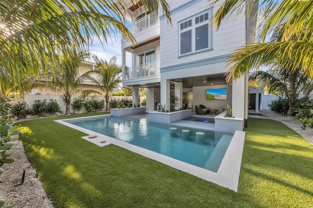 view of pool featuring a patio, a yard, and area for grilling