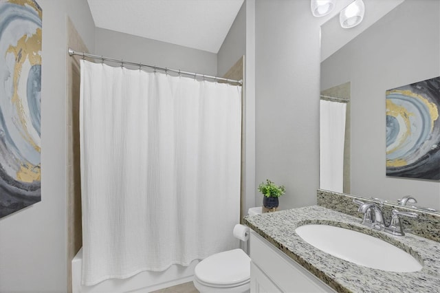 full bathroom with shower / bath combo with shower curtain, toilet, and vanity