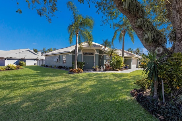 exterior space featuring a yard and a garage