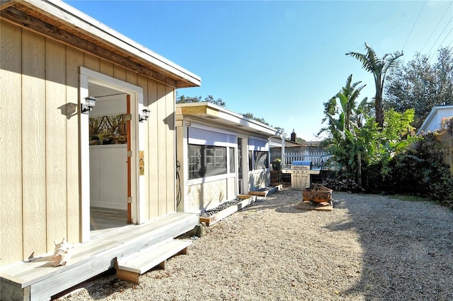 view of yard with an outdoor fire pit