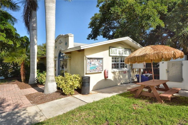 back of property with a patio area