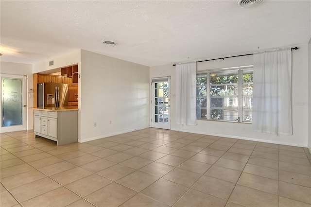 interior space featuring light tile patterned floors