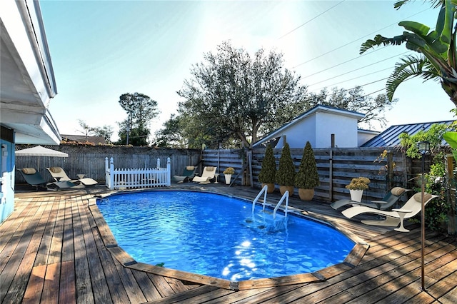 view of pool featuring a deck