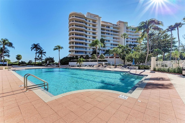 view of swimming pool featuring a patio area