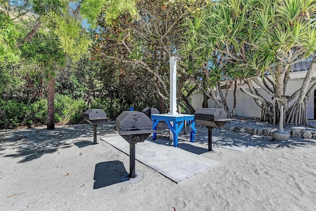 view of patio featuring a grill