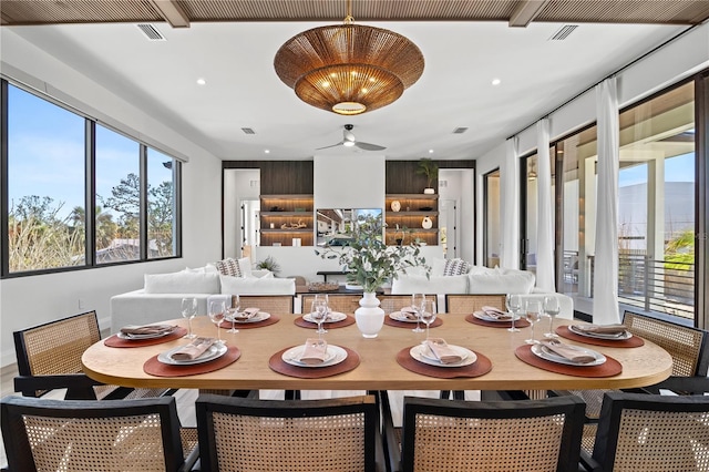 dining space featuring ceiling fan