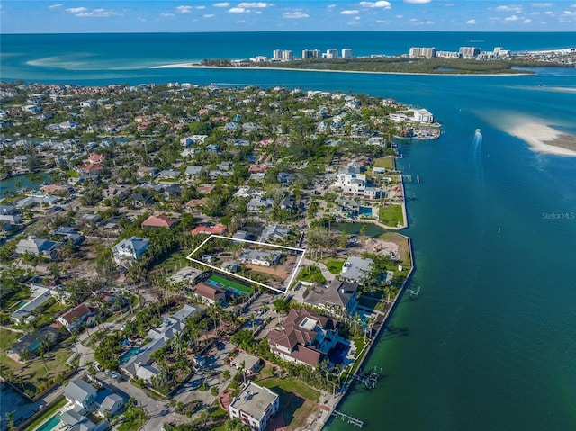 birds eye view of property featuring a water view