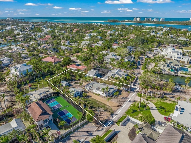 bird's eye view with a water view